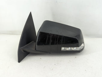 compare product 2009 Chevrolet Traverse Driver Side View Mirror - Left Door Mirror OEM Used