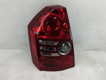 compare product 2009 Chrysler 300 Tail Light Assembly Passenger Right OEM P/N:DOM-3057 Fits OEM Used Auto Parts
