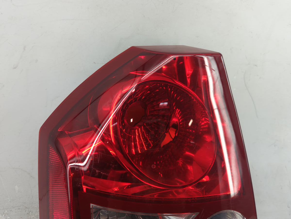 2009 Chrysler 300 Tail Light Assembly Passenger Right OEM P/N:DOM-3057 Fits OEM Used Auto Parts - Oemusedautoparts1.com