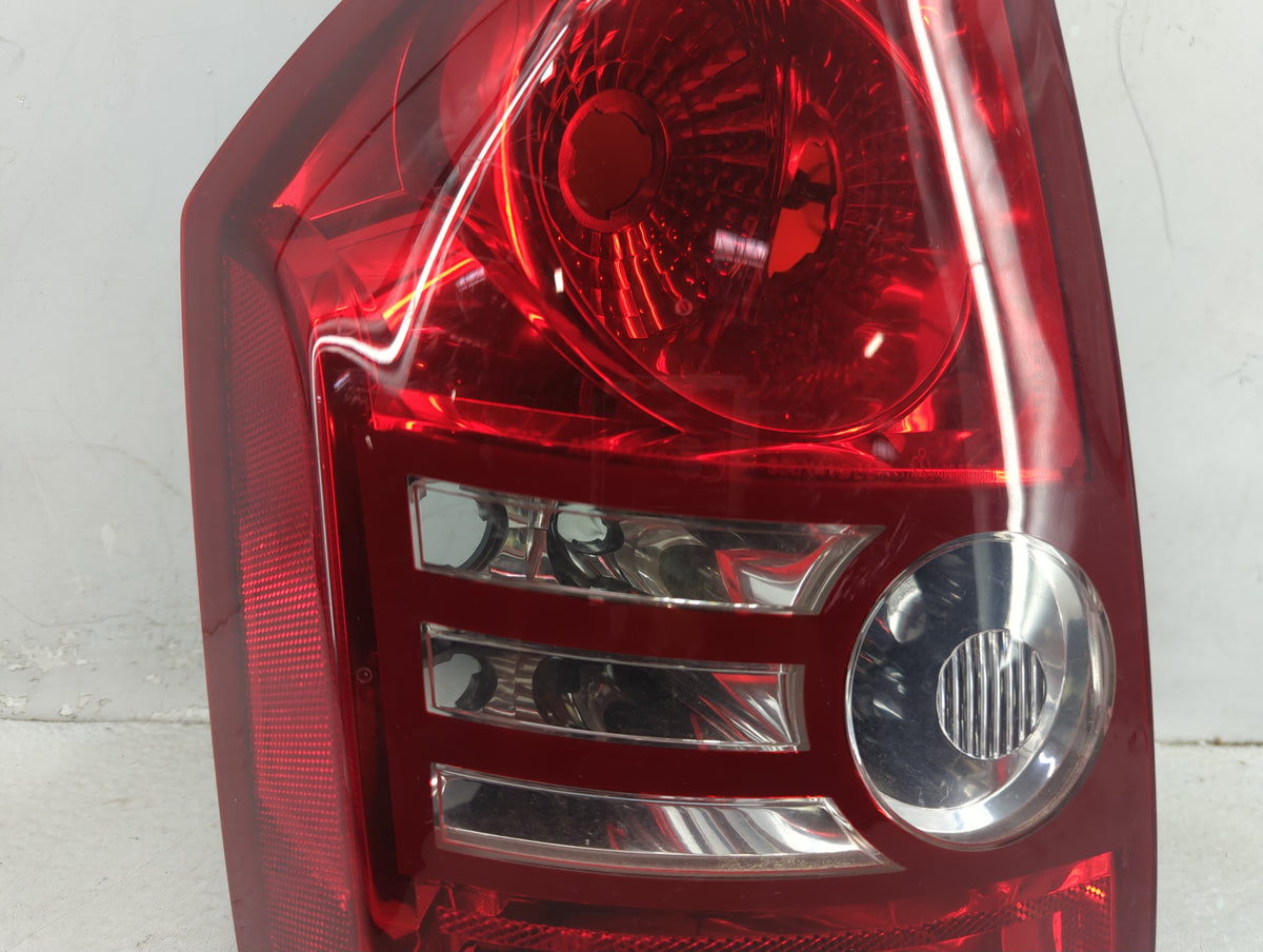 2009 Chrysler 300 Tail Light Assembly Passenger Right OEM P/N:DOM-3057 Fits OEM Used Auto Parts - Oemusedautoparts1.com