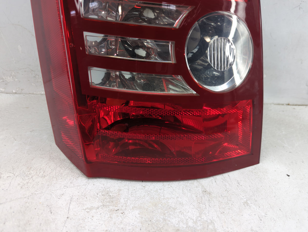 2009 Chrysler 300 Tail Light Assembly Passenger Right OEM P/N:DOM-3057 Fits OEM Used Auto Parts - Oemusedautoparts1.com