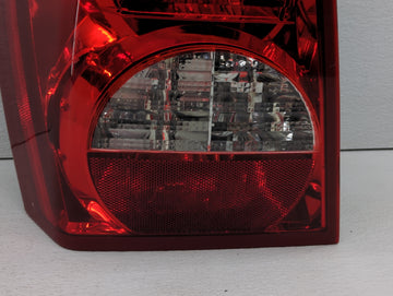 2008-2012 Dodge Caliber Tail Light Assembly Driver Left OEM P/N:320077 5160361 AA, 5303881 AH Fits Fits 2008 2009 2010 2011 2012 OEM Used Auto Parts