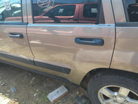 2005-2010 Jeep Grand Cherokee Driver Rear Door Oem 5020684 - Oemusedautoparts1.com