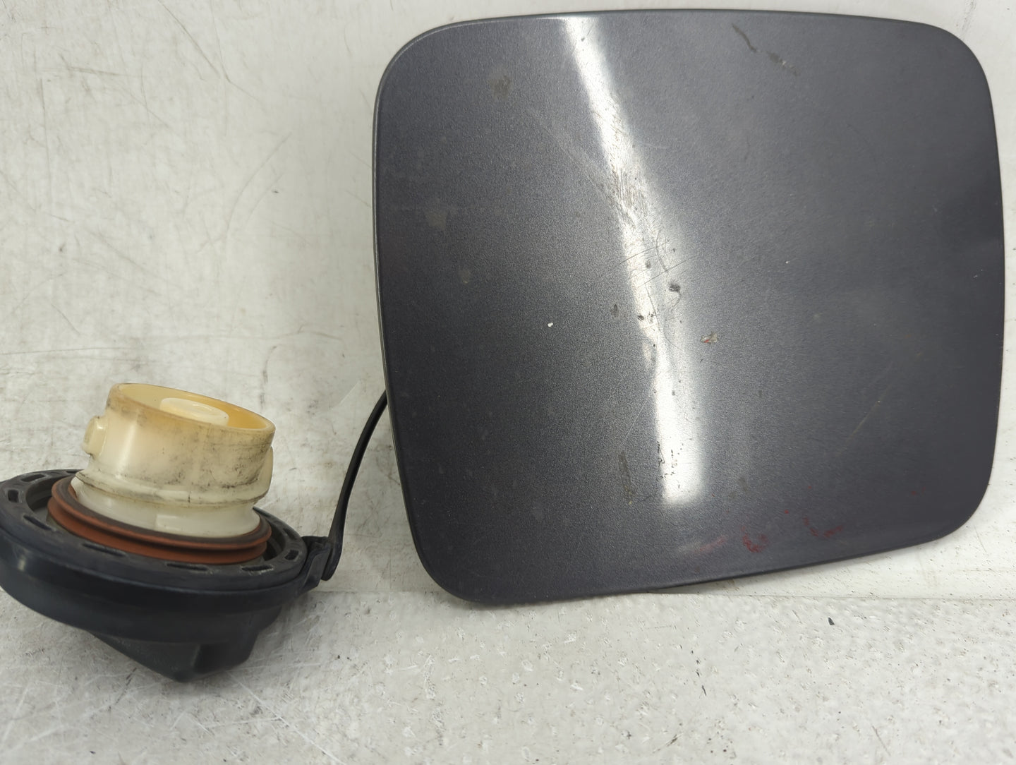 2009 Kia Optima Fuel Tank Door Lid Gas Tank Grey - Oemusedautoparts1.com