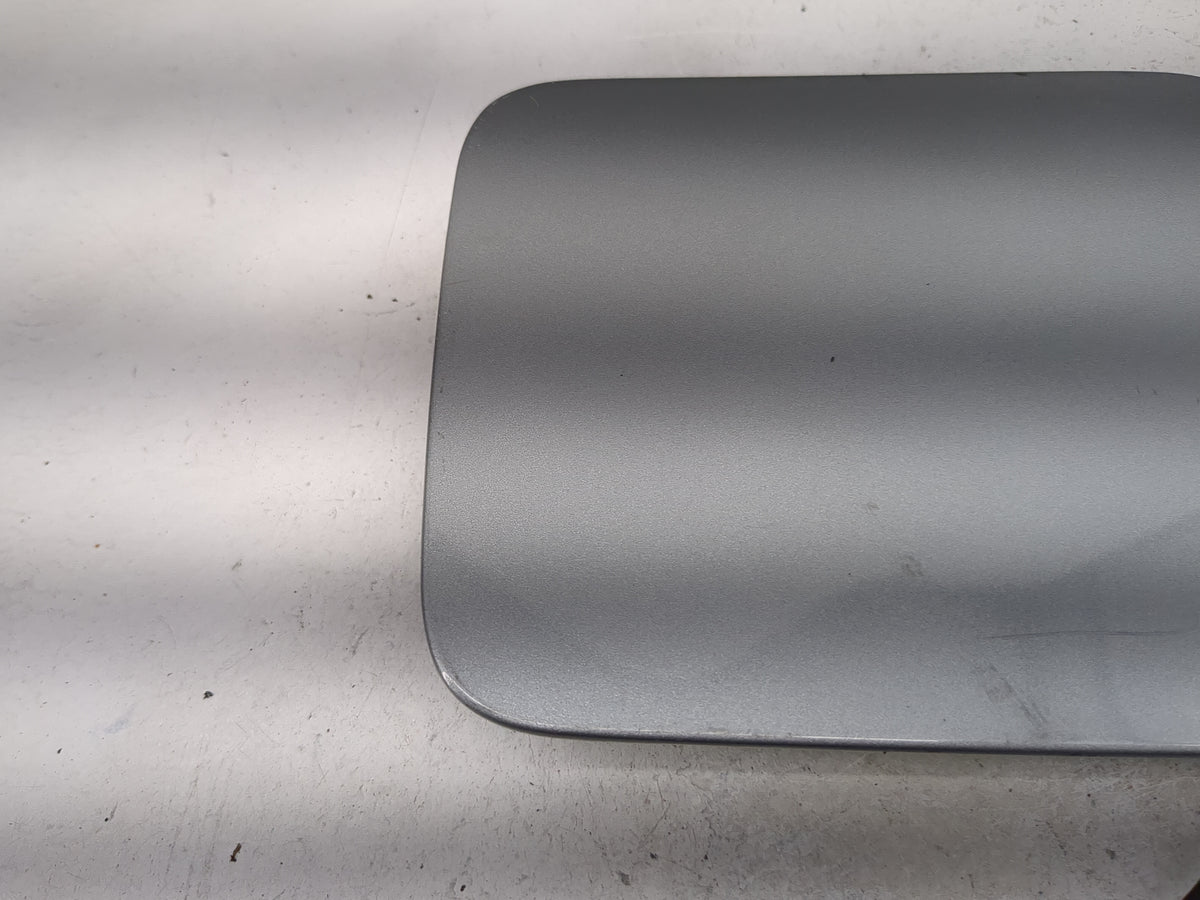 2009 Nissan Sentra Fuel Tank Door Lid Gas Tank Gray - Oemusedautoparts1.com