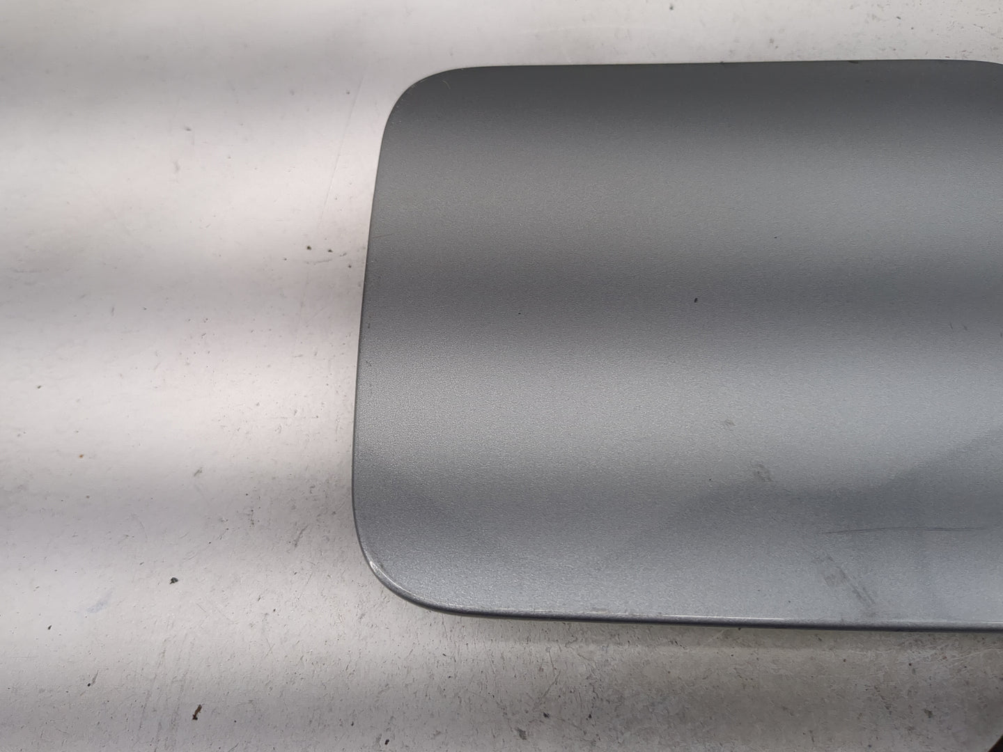 2009 Nissan Sentra Fuel Tank Door Lid Gas Tank Gray - Oemusedautoparts1.com