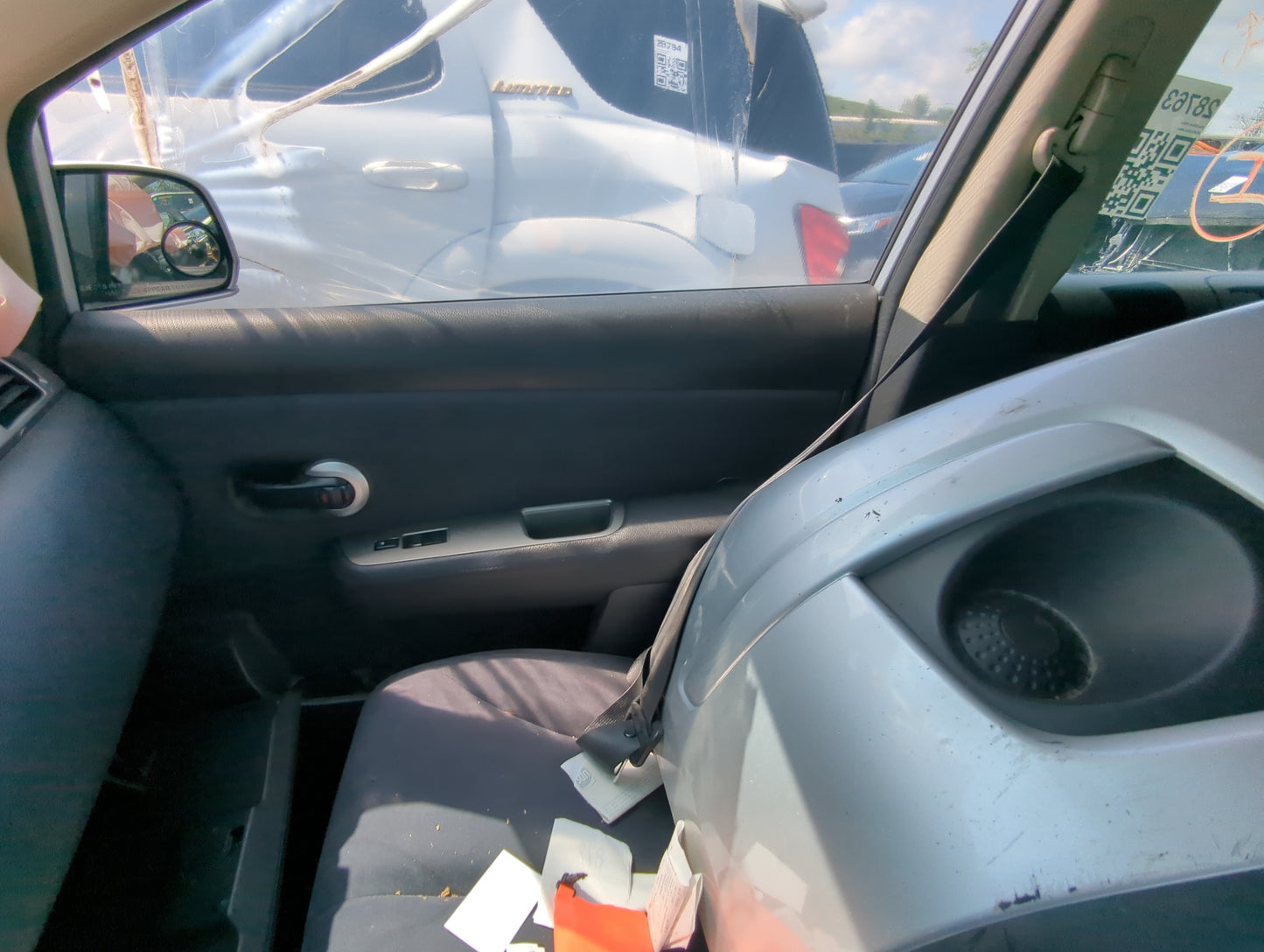 2009 Nissan Versa Front Right Passenger Interior Door Panel Trim - Oemusedautoparts1.com