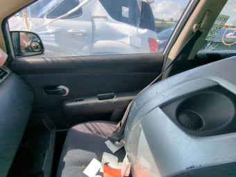 compare product 2009 Nissan Versa Front Right Passenger Interior Door Panel Trim