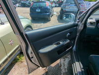 2009 Nissan Versa Front Left Driver Interior Door Panel Trim - Oemusedautoparts1.com