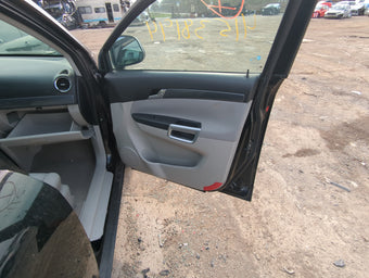 compare product 2009 Saturn Vue Front Right Passenger Interior Door Panel Trim