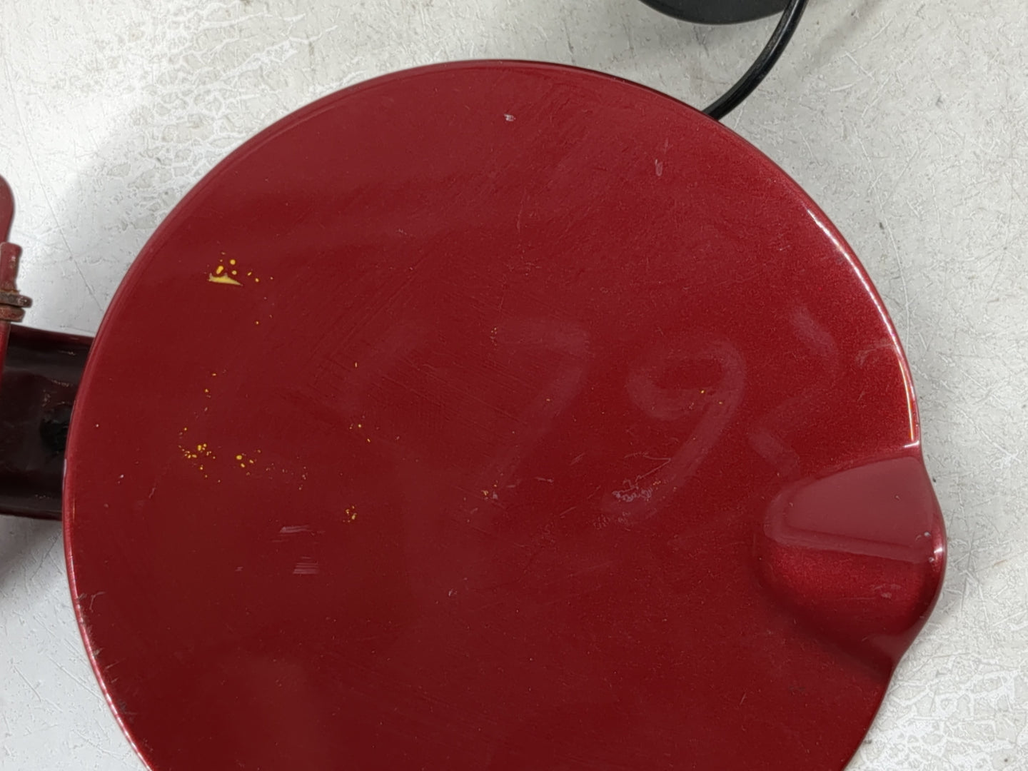 2009 Volkswagen Routan Fuel Tank Door Lid Gas Tank Red - Oemusedautoparts1.com