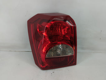 compare product 2008-2012 Dodge Caliber Tail Light Assembly Driver Left OEM P/N:05303753 05160361 Fits Fits 2008 2009 2010 2011 2012 OEM Used Auto Parts