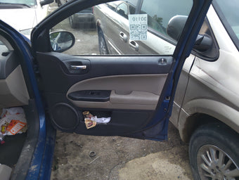 compare product 2010 Dodge Caliber Front Right Passenger Interior Door Panel Trim 5041950