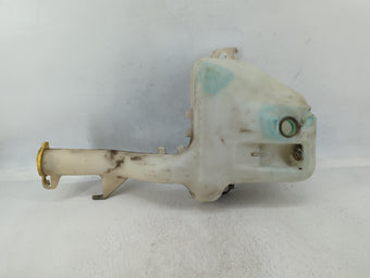compare product Dodge Caravan Windshield Washer Fluid Reservoir Bottle Oem
