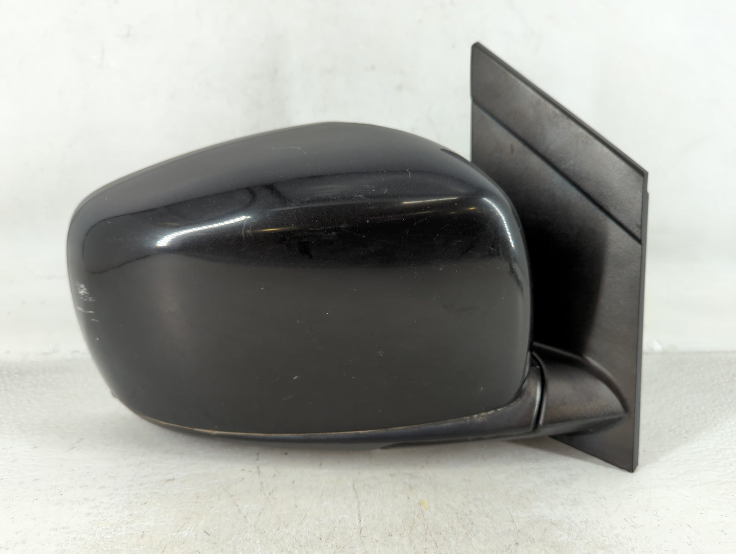 Dodge Caravan Passenger Right Side View Manual Door Mirror Black - Oemusedautoparts1.com