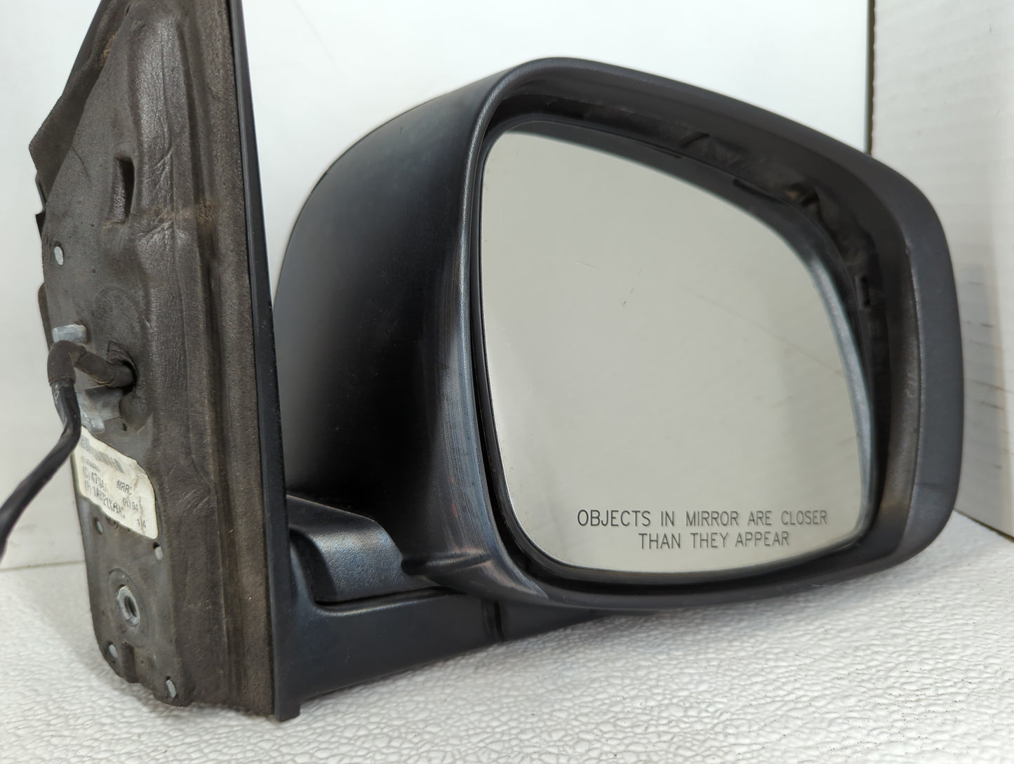 Dodge Caravan Passenger Right Side View Manual Door Mirror Black - Oemusedautoparts1.com
