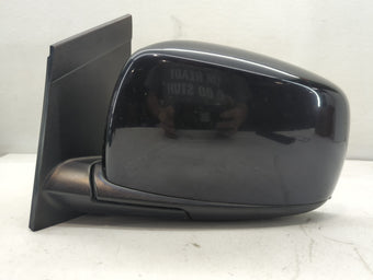 compare product 2010 Dodge Caravan Driver Side View Mirror - Left Door Mirror OEM Used