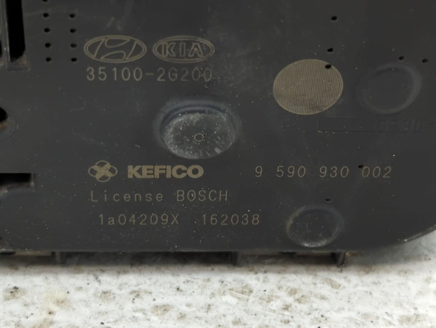 2010-2013 Kia Forte Throttle Body P/N:35100-2G200 Fits Fits 2010 2011 2012 2013 OEM Used Auto Parts - Oemusedautoparts1.com