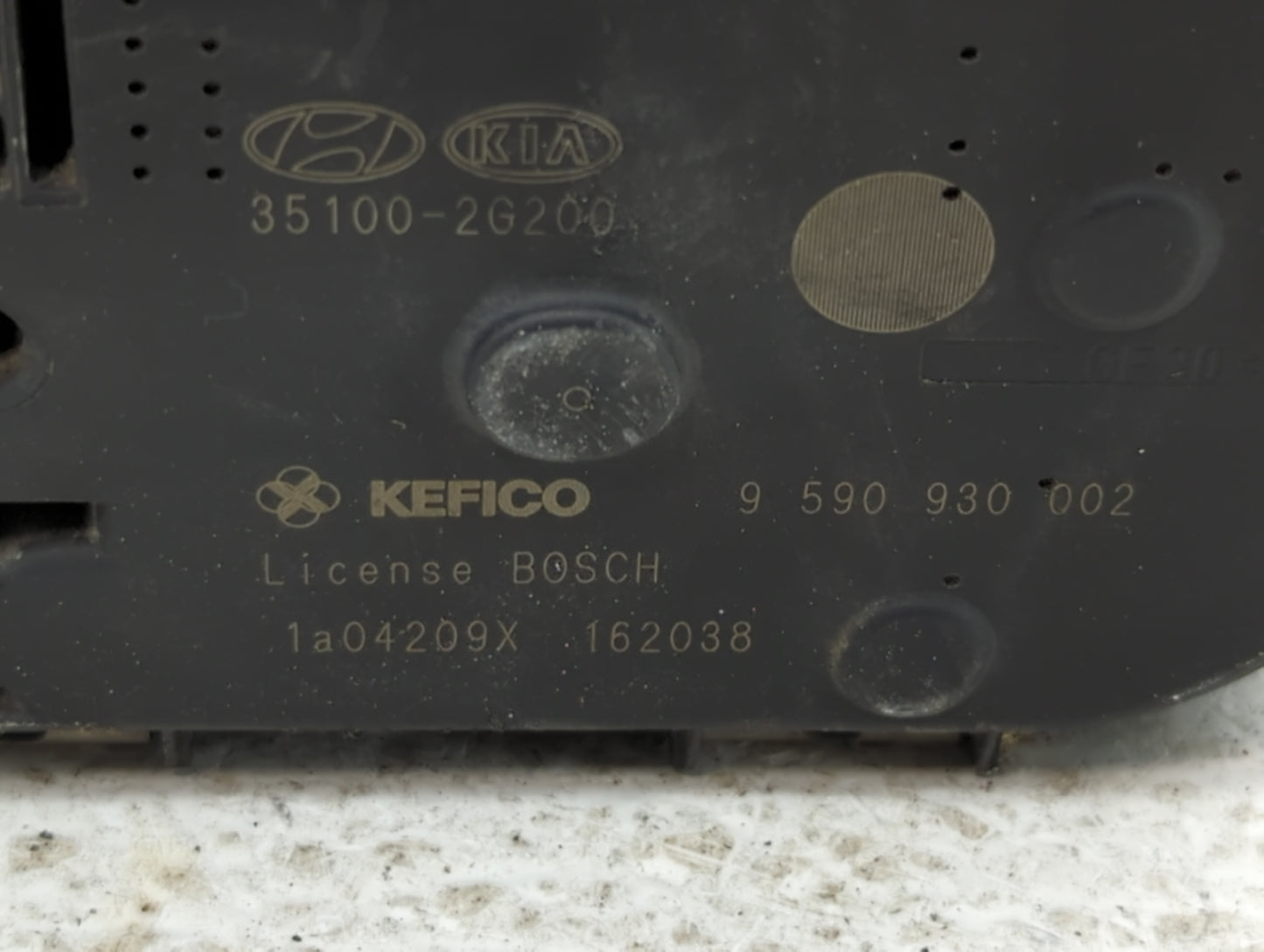 2010-2013 Kia Forte Throttle Body P/N:35100-2G200 Fits Fits 2010 2011 2012 2013 OEM Used Auto Parts - Oemusedautoparts1.com