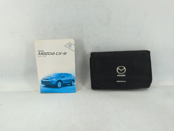 compare product 2010 Mazda Cx-9 Owners Manual Book Guide P/N:9999-95-011-10 OEM Used Auto Parts