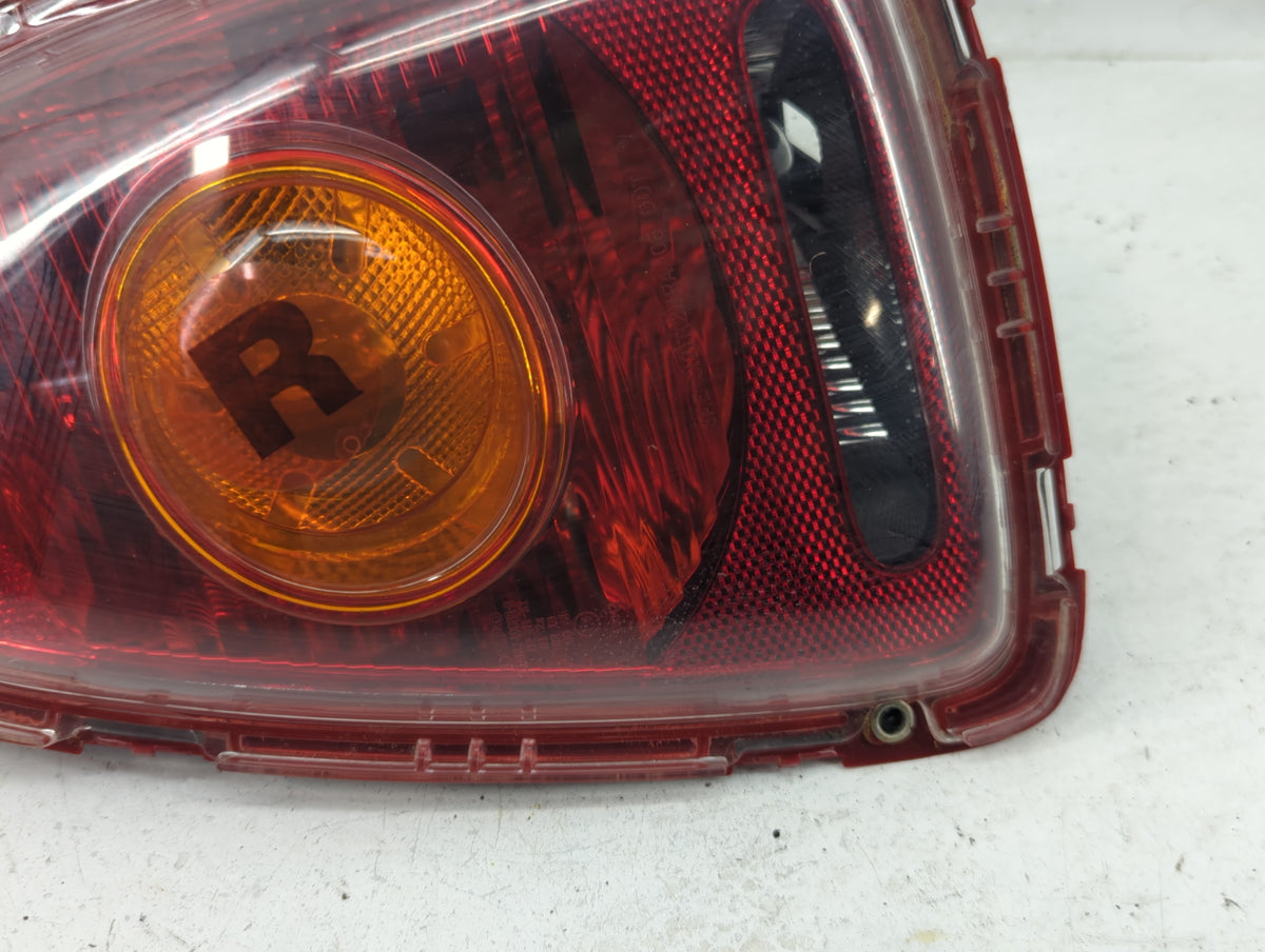 2007-2010 Mini Cooper Tail Light Assembly Passenger Right OEM P/N:04085758 882-1908R-AQ-YR Fits Fits 2007 2008 2009 2010 OEM