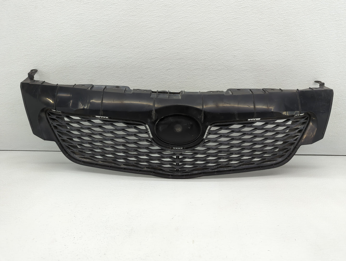 2009-2010 Toyota Corolla Front Bumper Grille Cover - Oemusedautoparts1.com