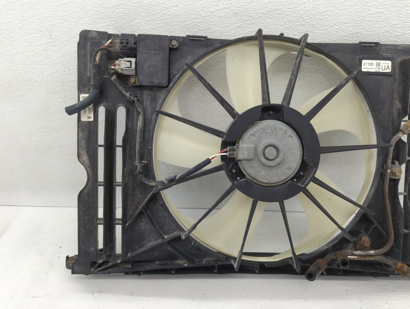2009-2014 Toyota Matrix Left Radiator Fan Motor Assembly Cream - Oemusedautoparts1.com