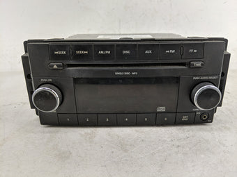 compare product 2009-2011 Volkswagen Routan Radio AM FM Cd Player Receiver Replacement P/N:P68050440AC Fits Fits 2009 2010 2011 OEM Used Auto Parts