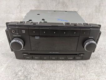 compare product 2009-2011 Volkswagen Routan Radio AM FM Cd Player Receiver Replacement P/N:P68050440AC Fits Fits 2009 2010 2011 OEM Used Auto Parts