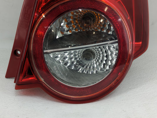 2011 Chevrolet Aveo Tail Light Assembly Driver Left OEM P/N:E132707 Fits OEM Used Auto Parts