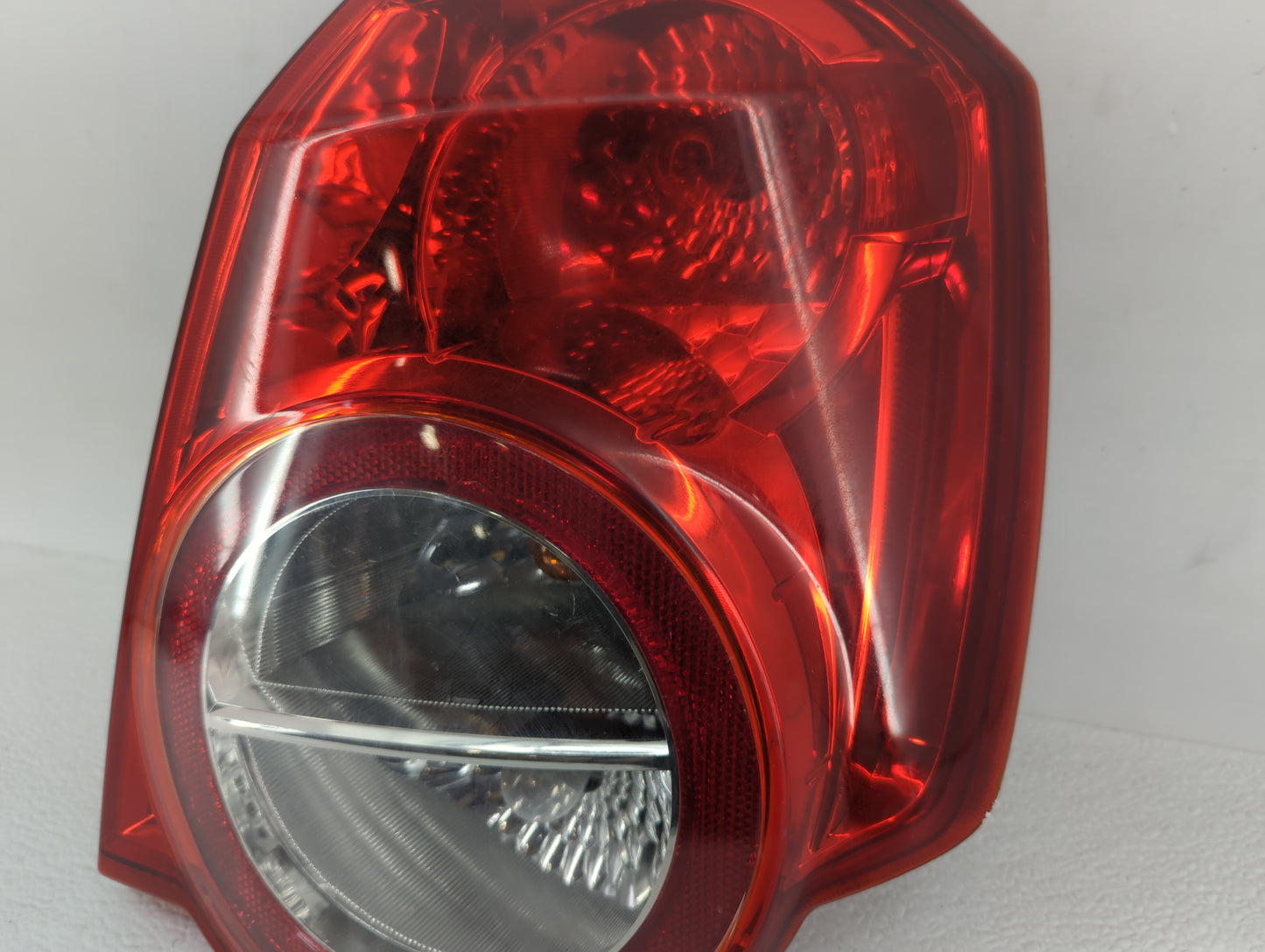 2011 Chevrolet Aveo Tail Light Assembly Driver Left OEM P/N:E132707 Fits OEM Used Auto Parts - Oemusedautoparts1.com