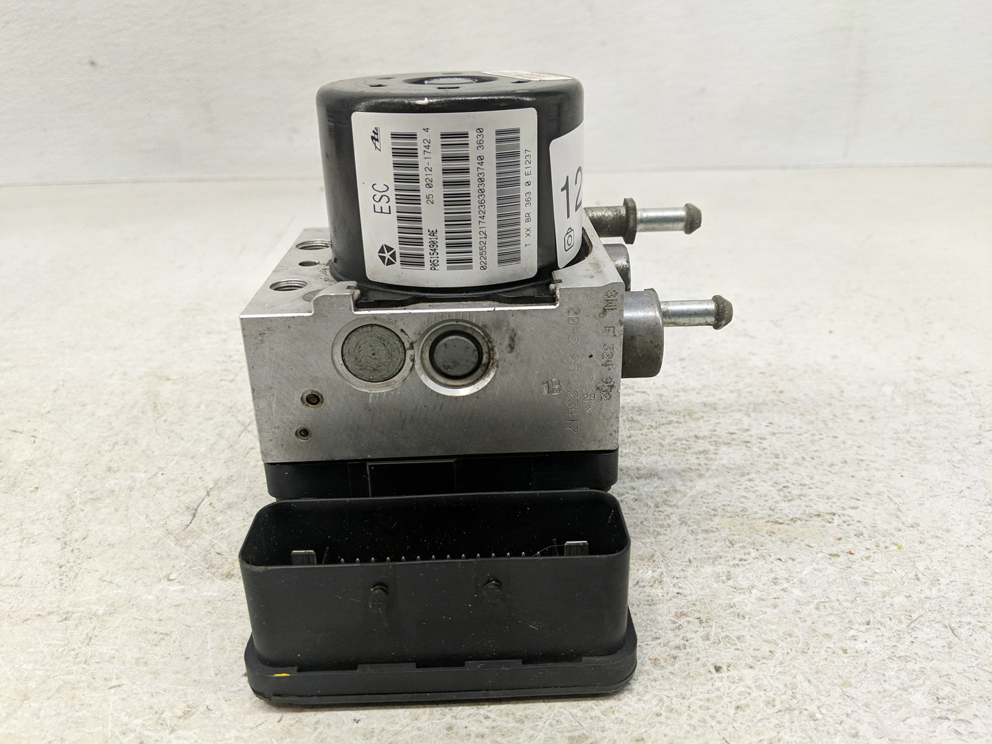 2011 Chrysler Town & Country ABS Pump Control Module Replacement P/N:P05154901AE Fits OEM Used Auto Parts - Oemusedautoparts