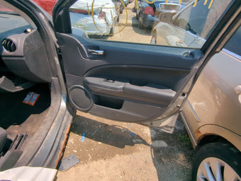 compare product 2011 Dodge Caliber Front Right Passenger Interior Door Panel Trim 1051685