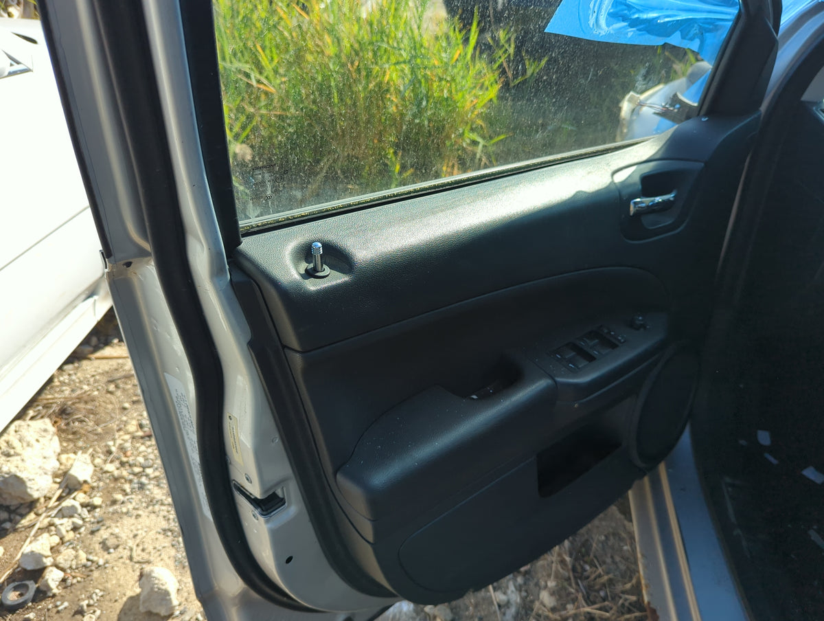 2011 Dodge Caliber Front Left Driver Interior Door Panel Trim 1155079 - Oemusedautoparts1.com