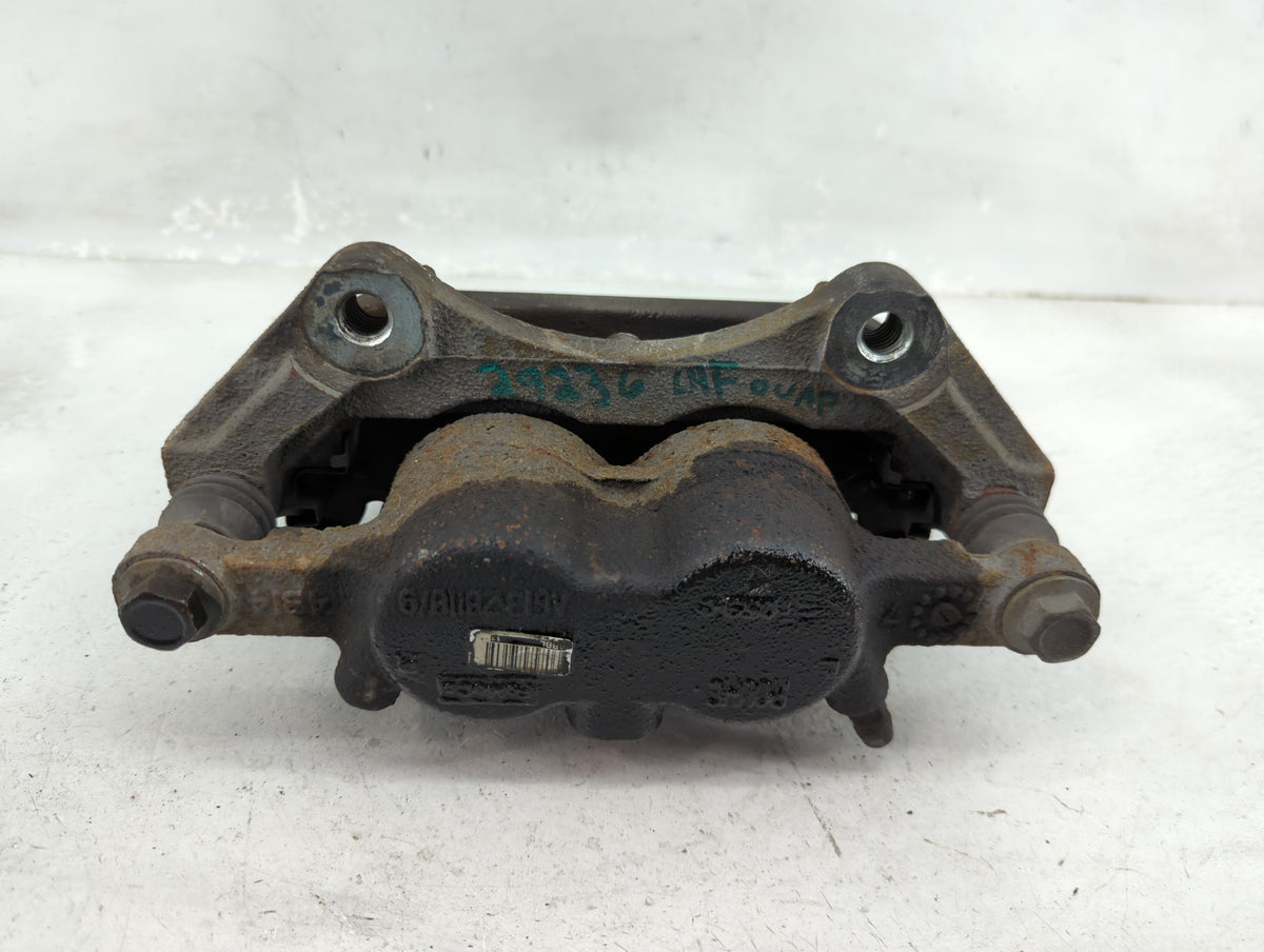 2010-2019 Ford Taurus Front Driver Left Brake Caliper 1205750 - Oemusedautoparts1.com