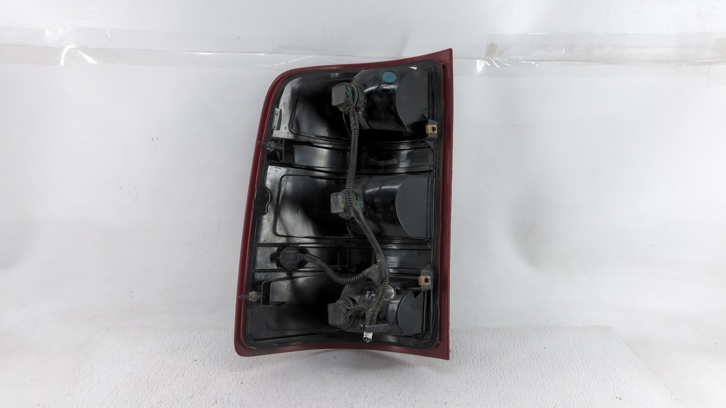 2004-2005 Gmc Sierra 1500 Tail Light Assembly Driver Left OEM P/N:320130A1 Fits Fits 2004 2005 OEM Used Auto Parts - Oemused