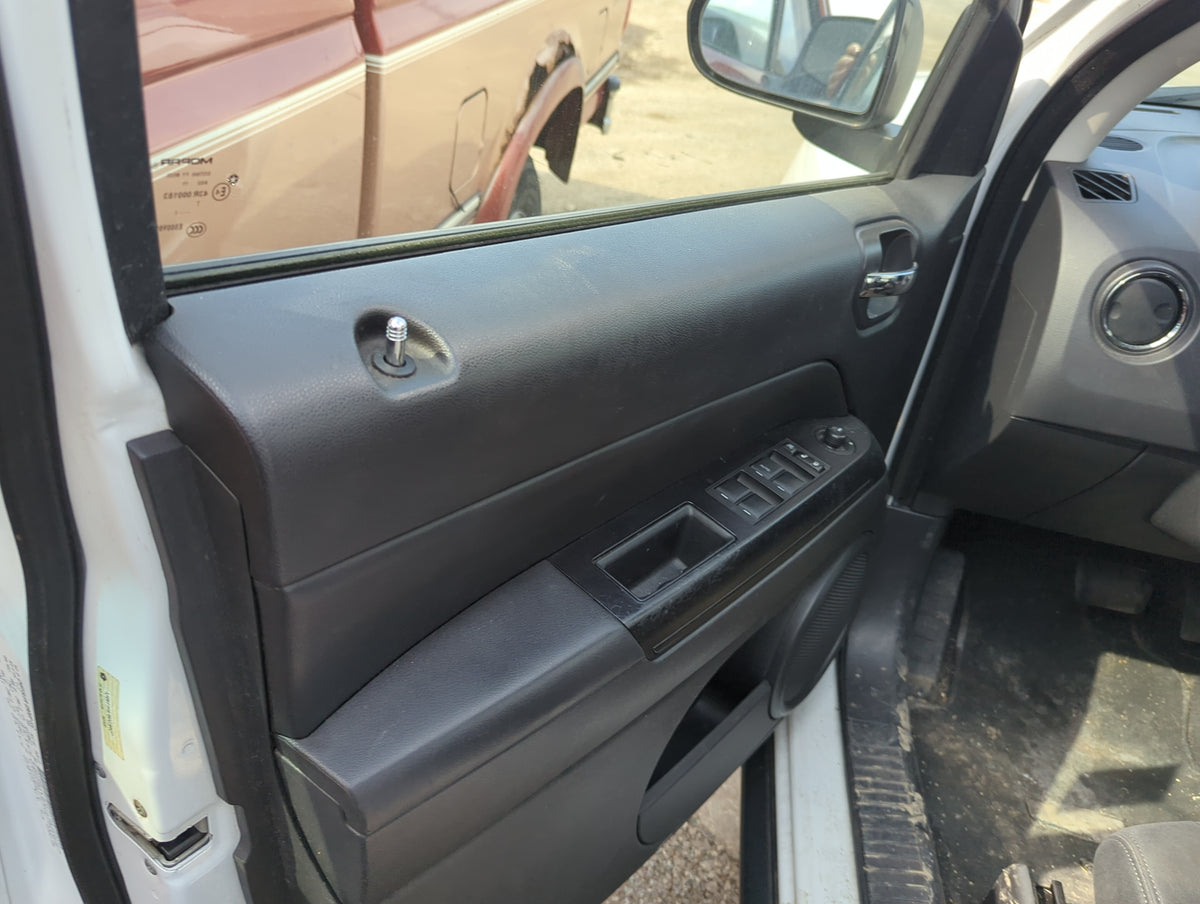 2011 Jeep Compass Front Left Driver Interior Door Panel Trim - Oemusedautoparts1.com