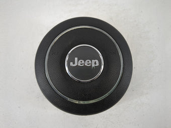 compare product 2011 Jeep Grand Cherokee Air Bag Driver Left Steering Wheel Mounted Fits OEM Used Auto Parts