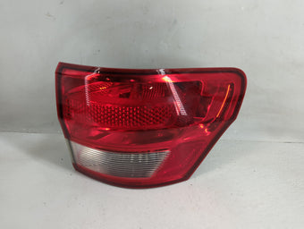 compare product 2011 Jeep Grand Cherokee Tail Light Assembly Passenger Right OEM Fits OEM Used Auto Parts