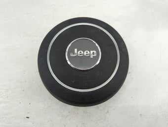 compare product 2011 Jeep Grand Cherokee Air Bag Driver Left Steering Wheel Mounted Fits OEM Used Auto Parts