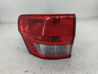 compare product 2011 Jeep Grand Cherokee Tail Light Assembly Driver Left OEM P/N:55079415AE Fits OEM Used Auto Parts