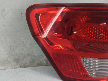 2011 Jeep Grand Cherokee Tail Light Assembly Driver Left OEM P/N:DOM 70031AE BUX 70051AE, DOM 70039, BUX 70059, DOM 7440 Fits OEM Used Auto Parts