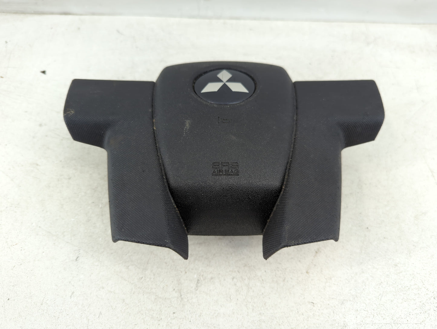 2011 Mitsubishi Endeavor Air Bag Driver Left Steering Wheel Mounted - Oemusedautoparts1.com