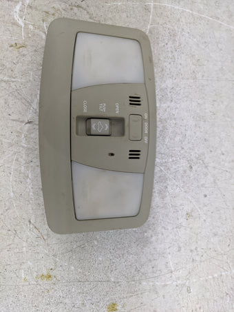 compare product 2011 Nissan Maxima Overhead Roof Console Tan