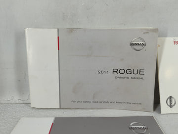 2011 Nissan Rogue Owners Manual Book Guide P/N:OM1E-0S35U0 OEM Used Auto Parts