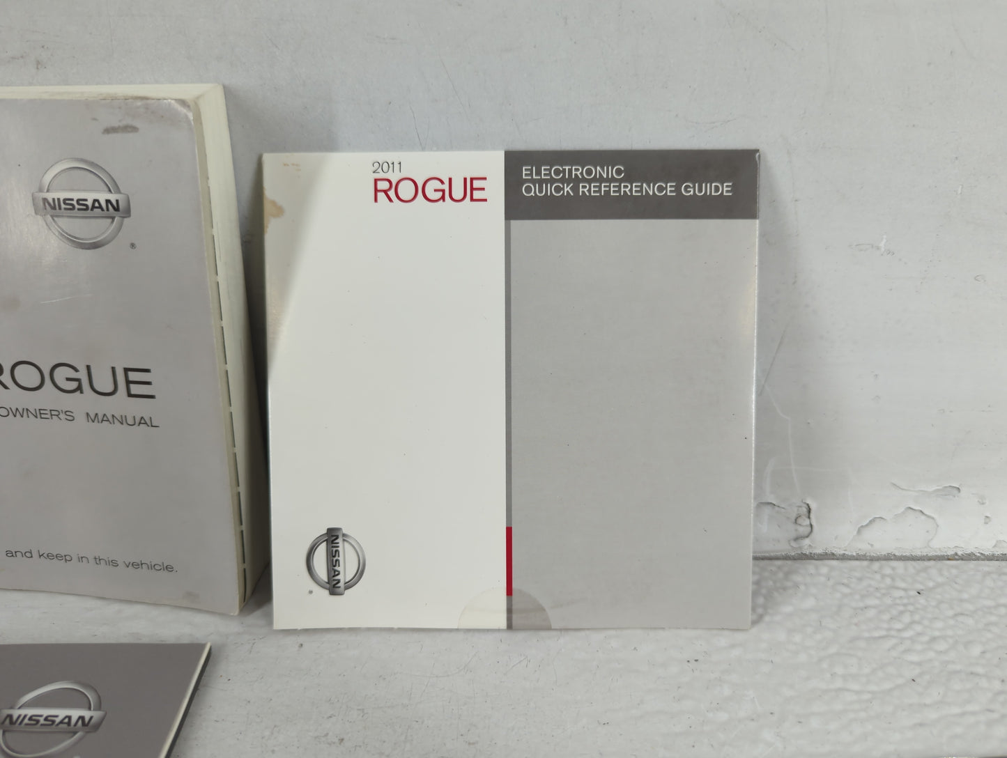 2011 Nissan Rogue Owners Manual Book Guide P/N:OM1E-0S35U0 OEM Used Auto Parts - Oemusedautoparts1.com