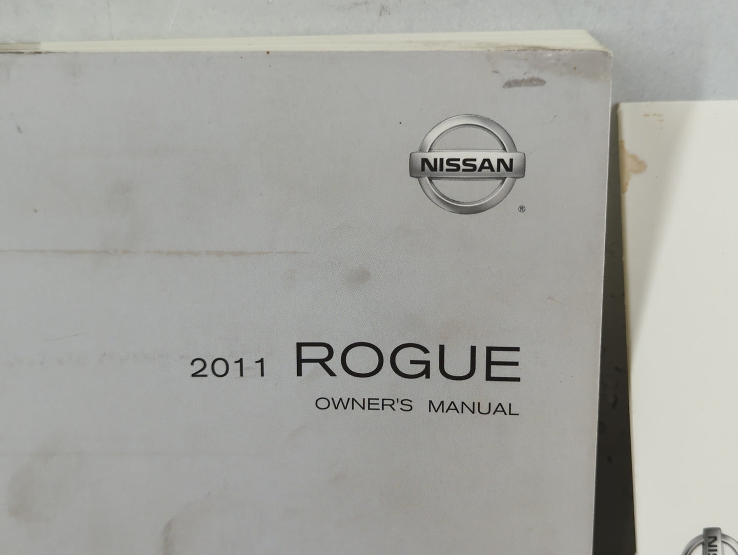 2011 Nissan Rogue Owners Manual Book Guide P/N:OM1E-0S35U0 OEM Used Auto Parts - Oemusedautoparts1.com