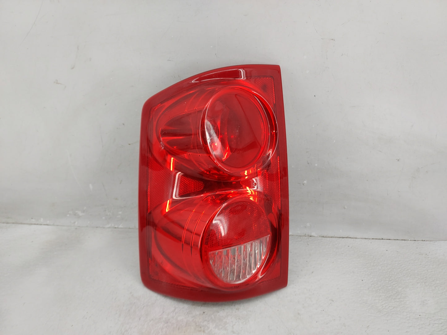 2011 Ram Dakota Tail Light Assembly Driver Left OEM Fits Fits 2005 2006 2007 2008 2009 2010 OEM Used Auto Parts - Oemusedaut