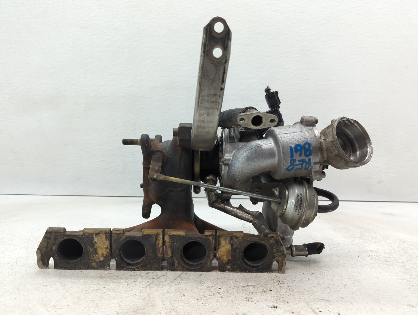 2009 Volkswagen Tiguan Turbocharger Exhaust Manifold With Turbo Charger - Oemusedautoparts1.com