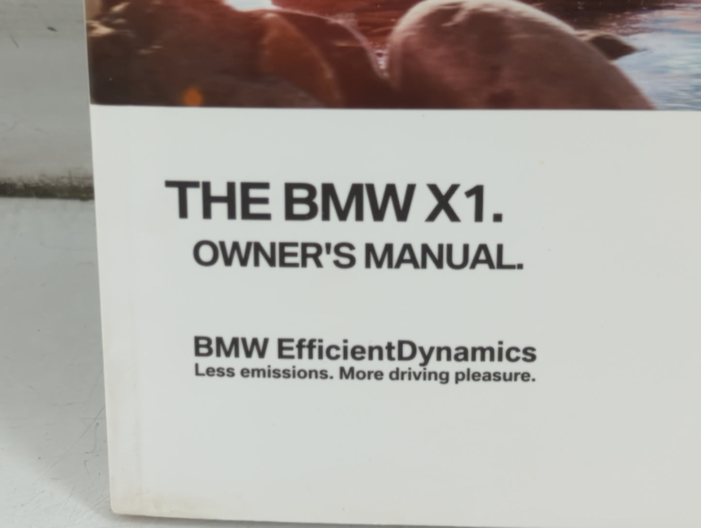 2012 Bmw X1 Owners Manual Book Guide P/N:01 40 2 914 573 OEM Used Auto Parts - Oemusedautoparts1.com